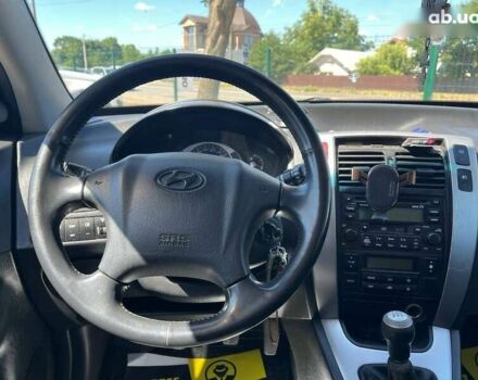 Хендай Туксон, объемом двигателя 2 л и пробегом 219 тыс. км за 8200 $, фото 8 на Automoto.ua
