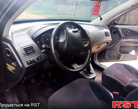 Хендай Туксон, об'ємом двигуна 2 л та пробігом 220 тис. км за 7750 $, фото 3 на Automoto.ua