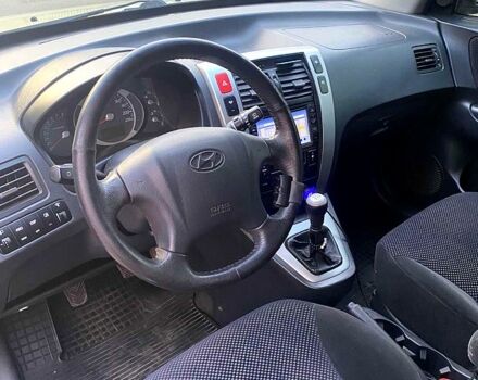 Хендай Туксон, объемом двигателя 2 л и пробегом 226 тыс. км за 7950 $, фото 7 на Automoto.ua
