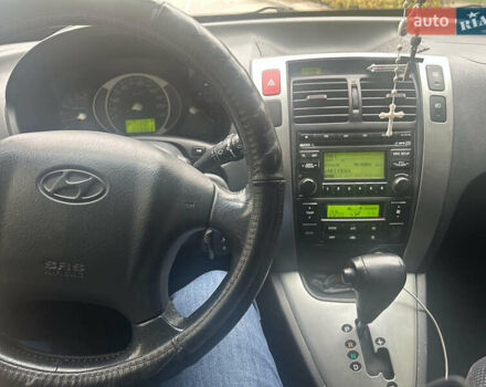 Хендай Туксон, объемом двигателя 2 л и пробегом 213 тыс. км за 8300 $, фото 11 на Automoto.ua