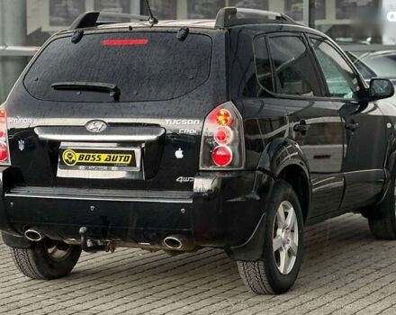 Хендай Туксон, объемом двигателя 2 л и пробегом 244 тыс. км за 9200 $, фото 5 на Automoto.ua