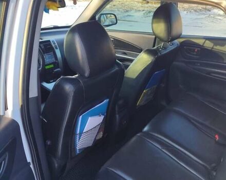 Хендай Туксон, об'ємом двигуна 2 л та пробігом 235 тис. км за 7500 $, фото 7 на Automoto.ua