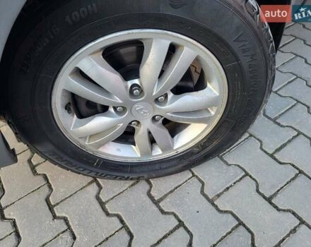 Хендай Туксон, объемом двигателя 2 л и пробегом 213 тыс. км за 10400 $, фото 7 на Automoto.ua