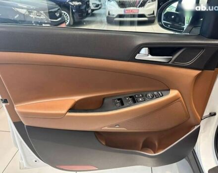 Хендай Туксон, объемом двигателя 2 л и пробегом 213 тыс. км за 18900 $, фото 10 на Automoto.ua