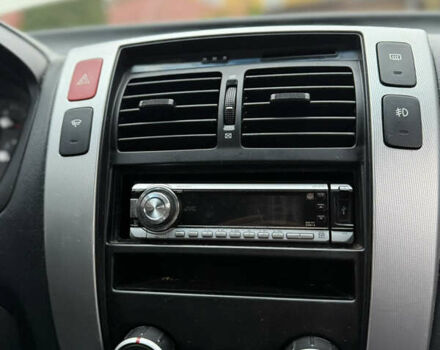 Жовтий Хендай Туксон, об'ємом двигуна 1.98 л та пробігом 192 тис. км за 6800 $, фото 10 на Automoto.ua