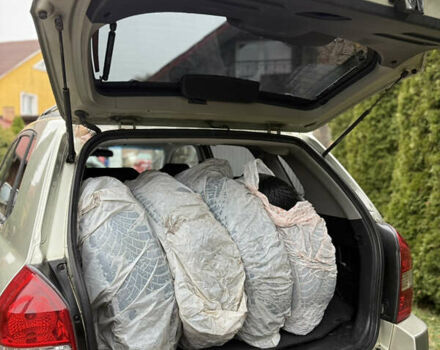 Жовтий Хендай Туксон, об'ємом двигуна 1.98 л та пробігом 192 тис. км за 6800 $, фото 6 на Automoto.ua