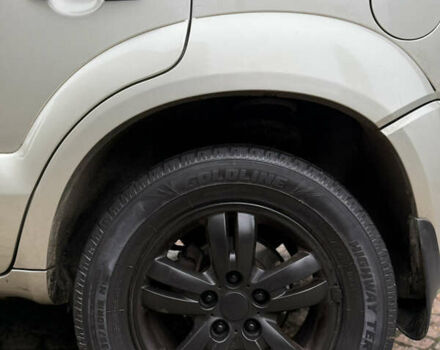 Жовтий Хендай Туксон, об'ємом двигуна 1.98 л та пробігом 192 тис. км за 6800 $, фото 3 на Automoto.ua