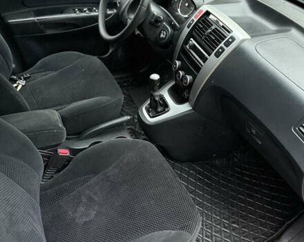 Жовтий Хендай Туксон, об'ємом двигуна 1.98 л та пробігом 192 тис. км за 6800 $, фото 7 на Automoto.ua