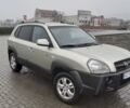 Жовтий Хендай Туксон, об'ємом двигуна 2 л та пробігом 207 тис. км за 8200 $, фото 1 на Automoto.ua