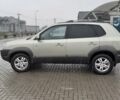 Желтый Хендай Туксон, объемом двигателя 2 л и пробегом 207 тыс. км за 8200 $, фото 6 на Automoto.ua