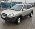 Желтый Хендай Туксон, объемом двигателя 2 л и пробегом 207 тыс. км за 8200 $, фото 2 на Automoto.ua
