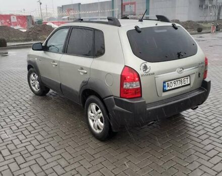 Желтый Хендай Туксон, объемом двигателя 2 л и пробегом 207 тыс. км за 8200 $, фото 5 на Automoto.ua