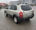 Желтый Хендай Туксон, объемом двигателя 2 л и пробегом 207 тыс. км за 8200 $, фото 5 на Automoto.ua