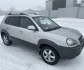 Серый Хендай Туксон, объемом двигателя 2 л и пробегом 250 тыс. км за 4500 $, фото 3 на Automoto.ua