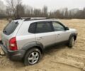 Серый Хендай Туксон, объемом двигателя 2 л и пробегом 267 тыс. км за 4300 $, фото 1 на Automoto.ua