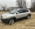 Серый Хендай Туксон, объемом двигателя 2 л и пробегом 267 тыс. км за 4300 $, фото 2 на Automoto.ua