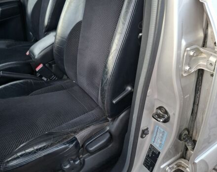 Серый Хендай Туксон, объемом двигателя 2 л и пробегом 320 тыс. км за 4200 $, фото 3 на Automoto.ua