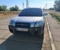 Серый Хендай Туксон, объемом двигателя 2 л и пробегом 241 тыс. км за 7000 $, фото 4 на Automoto.ua