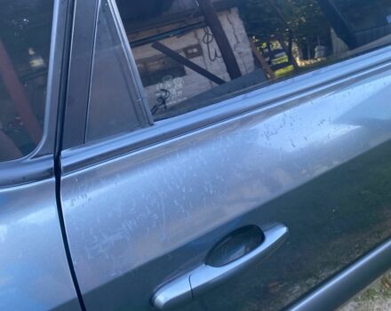 Сірий Хендай Туксон, об'ємом двигуна 2 л та пробігом 248 тис. км за 6100 $, фото 5 на Automoto.ua