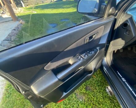 Сірий Хендай Туксон, об'ємом двигуна 2 л та пробігом 248 тис. км за 6100 $, фото 10 на Automoto.ua