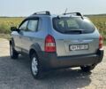 Сірий Хендай Туксон, об'ємом двигуна 2 л та пробігом 160 тис. км за 9200 $, фото 9 на Automoto.ua
