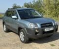 Сірий Хендай Туксон, об'ємом двигуна 2 л та пробігом 160 тис. км за 9200 $, фото 13 на Automoto.ua
