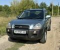 Сірий Хендай Туксон, об'ємом двигуна 2 л та пробігом 160 тис. км за 9200 $, фото 4 на Automoto.ua