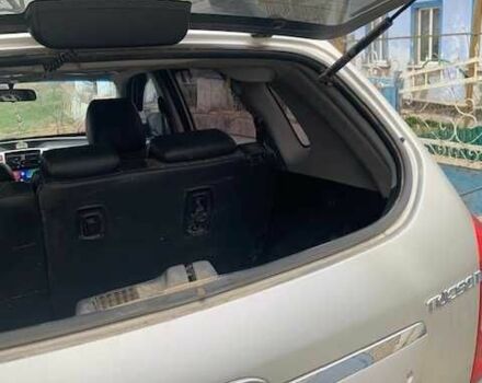 Сірий Хендай Туксон, об'ємом двигуна 2 л та пробігом 215 тис. км за 8500 $, фото 6 на Automoto.ua