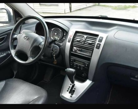 Серый Хендай Туксон, объемом двигателя 2 л и пробегом 230 тыс. км за 5500 $, фото 12 на Automoto.ua