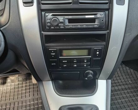 Серый Хендай Туксон, объемом двигателя 2 л и пробегом 220 тыс. км за 8800 $, фото 11 на Automoto.ua