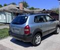 Серый Хендай Туксон, объемом двигателя 2 л и пробегом 169 тыс. км за 9298 $, фото 6 на Automoto.ua