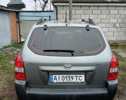 Серый Хендай Туксон, объемом двигателя 2 л и пробегом 78 тыс. км за 11600 $, фото 1 на Automoto.ua