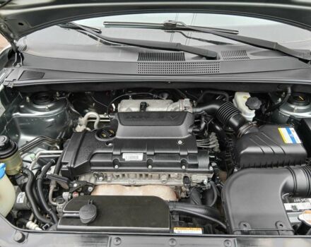 Серый Хендай Туксон, объемом двигателя 2 л и пробегом 78 тыс. км за 11600 $, фото 8 на Automoto.ua