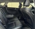 Серый Хендай Туксон, объемом двигателя 2 л и пробегом 195 тыс. км за 17018 $, фото 19 на Automoto.ua