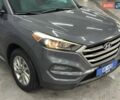 Серый Хендай Туксон, объемом двигателя 2 л и пробегом 141 тыс. км за 15800 $, фото 1 на Automoto.ua