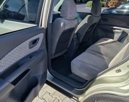 Серый Хендай Туксон, объемом двигателя 1.99 л и пробегом 275 тыс. км за 4400 $, фото 13 на Automoto.ua