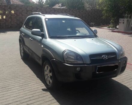 Серый Хендай Туксон, объемом двигателя 2 л и пробегом 235 тыс. км за 4600 $, фото 1 на Automoto.ua