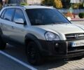 Серый Хендай Туксон, объемом двигателя 2 л и пробегом 275 тыс. км за 4400 $, фото 1 на Automoto.ua