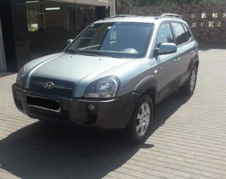 Серый Хендай Туксон, объемом двигателя 2 л и пробегом 235 тыс. км за 4600 $, фото 3 на Automoto.ua