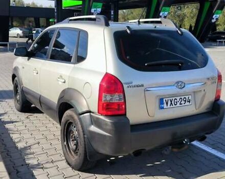 Серый Хендай Туксон, объемом двигателя 1.99 л и пробегом 275 тыс. км за 4400 $, фото 6 на Automoto.ua