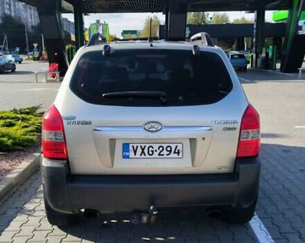 Серый Хендай Туксон, объемом двигателя 1.99 л и пробегом 275 тыс. км за 4400 $, фото 5 на Automoto.ua