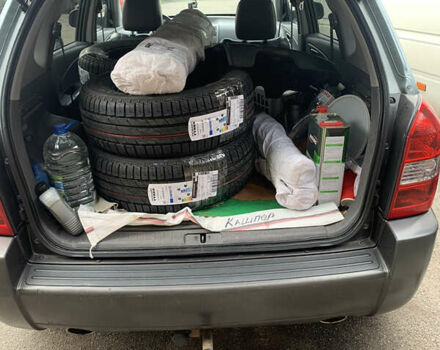 Серый Хендай Туксон, объемом двигателя 2.66 л и пробегом 297 тыс. км за 7000 $, фото 7 на Automoto.ua