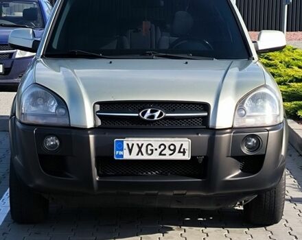 Серый Хендай Туксон, объемом двигателя 2 л и пробегом 275 тыс. км за 4400 $, фото 1 на Automoto.ua