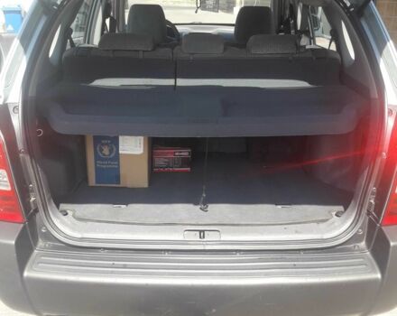 Серый Хендай Туксон, объемом двигателя 2 л и пробегом 235 тыс. км за 4600 $, фото 8 на Automoto.ua