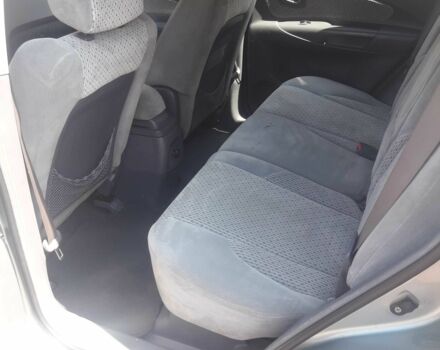 Серый Хендай Туксон, объемом двигателя 2 л и пробегом 235 тыс. км за 4600 $, фото 5 на Automoto.ua