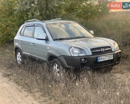 Серый Хендай Туксон, объемом двигателя 2.66 л и пробегом 297 тыс. км за 7000 $, фото 6 на Automoto.ua