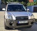 Серый Хендай Туксон, объемом двигателя 2 л и пробегом 240 тыс. км за 4200 $, фото 1 на Automoto.ua