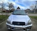 Серый Хендай Туксон, объемом двигателя 2 л и пробегом 236 тыс. км за 7000 $, фото 1 на Automoto.ua