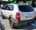 Серый Хендай Туксон, объемом двигателя 2 л и пробегом 275 тыс. км за 4400 $, фото 3 на Automoto.ua