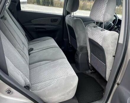 Серый Хендай Туксон, объемом двигателя 1.98 л и пробегом 243 тыс. км за 7100 $, фото 17 на Automoto.ua